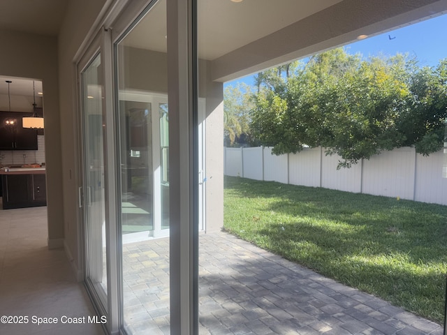 exterior space with a fenced backyard