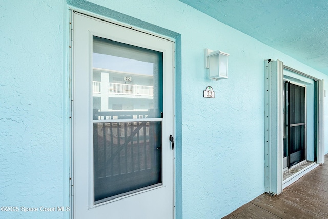 180 Flagler Ln Unit 22, Cocoa Beach, FL 32931 - property entrance with stucco siding
