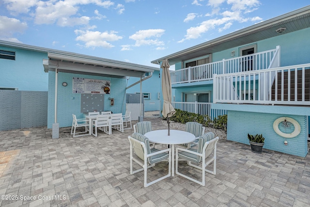 180 Flagler Ln Unit 22, Cocoa Beach, FL 32931 - view of patio / terrace featuring outdoor dining area