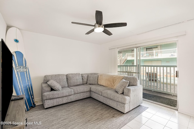 180 Flagler Ln Unit 22, Cocoa Beach, FL 32931 - living room featuring a ceiling fan and tile patterned floors