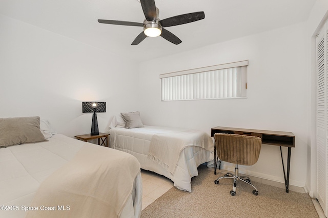 180 Flagler Ln Unit 22, Cocoa Beach, FL 32931 - bedroom with a ceiling fan and a closet