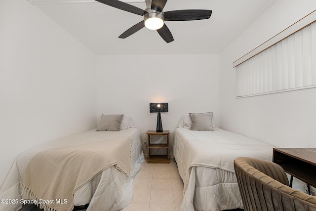 180 Flagler Ln Unit 22, Cocoa Beach, FL 32931 - bedroom featuring light tile patterned floors and ceiling fan