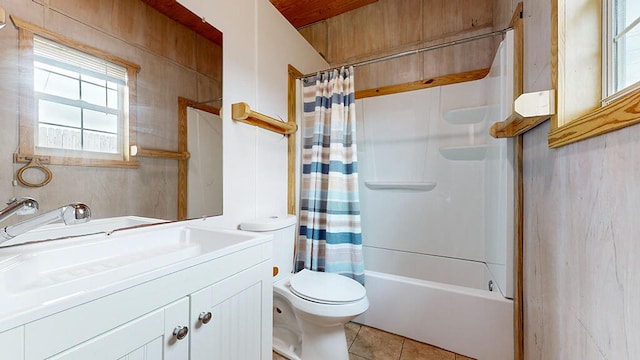 full bathroom with shower / bathtub combination with curtain, tile flooring, vanity, and toilet