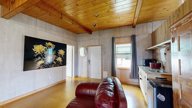 living room with sink, beam ceiling, light wood-type flooring, and wooden ceiling