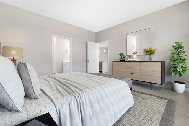 bedroom featuring ensuite bath