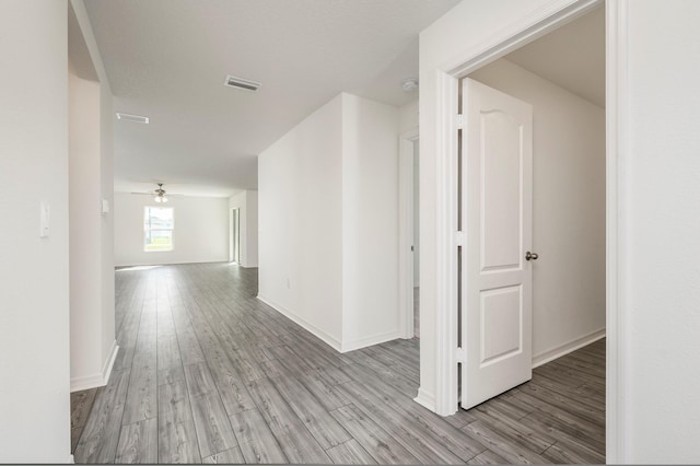 hallway featuring light hardwood / wood-style floors