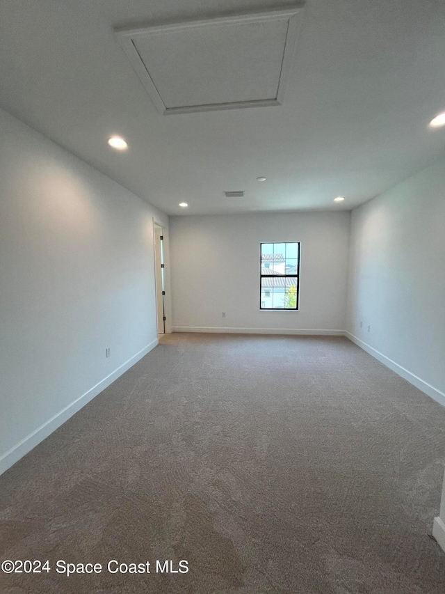 view of carpeted spare room