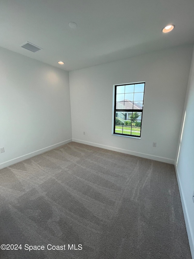 view of carpeted spare room