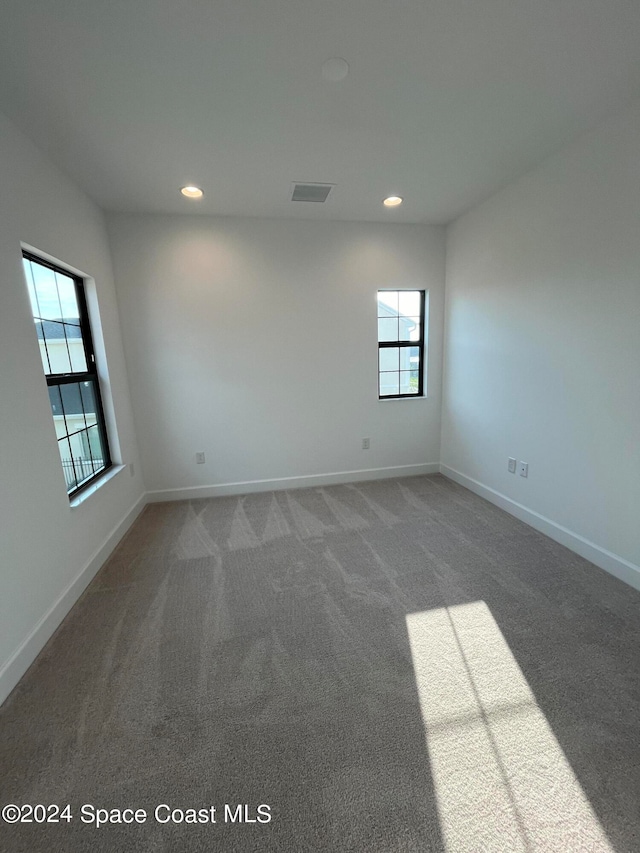 view of carpeted spare room