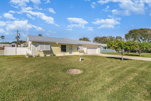 ranch-style house with a front lawn and a garage