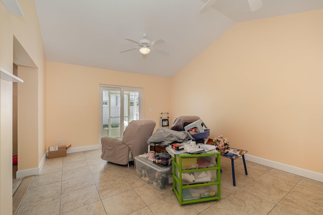 rec room with lofted ceiling, light tile flooring, and ceiling fan