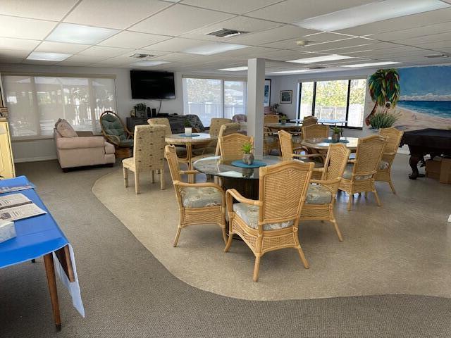 dining area featuring a paneled ceiling