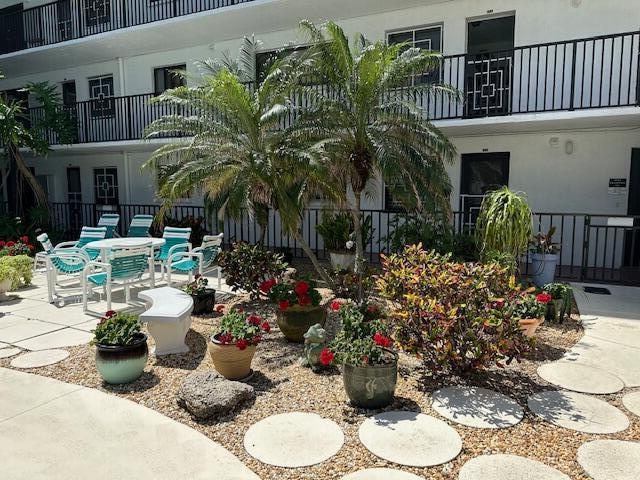 view of property's community with a patio