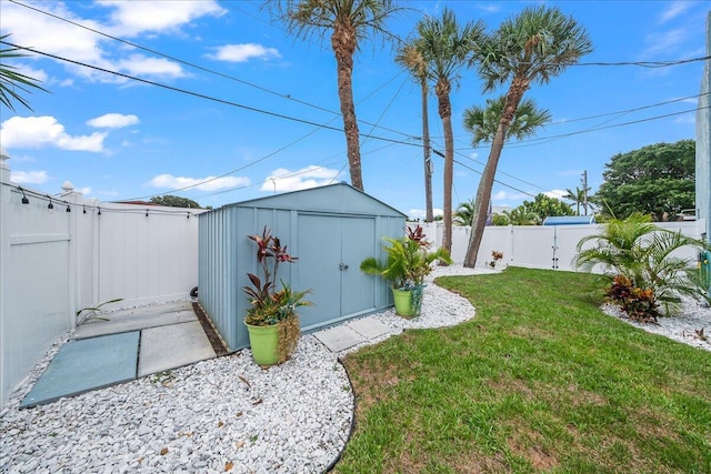 view of yard with a storage shed