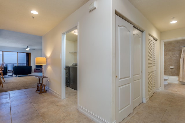 corridor featuring light tile floors