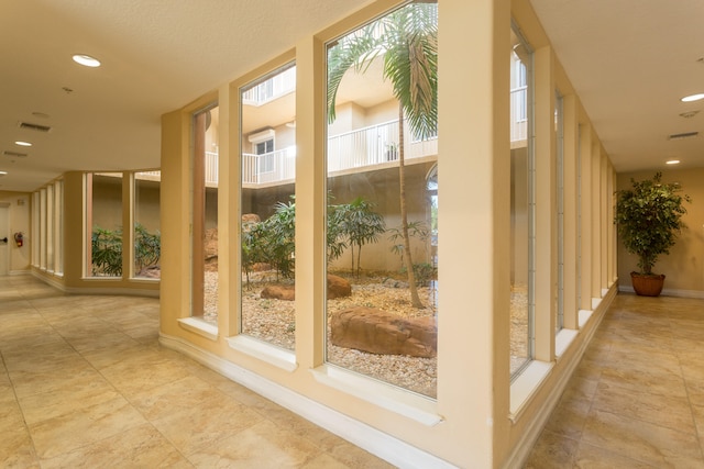 entryway featuring light tile floors