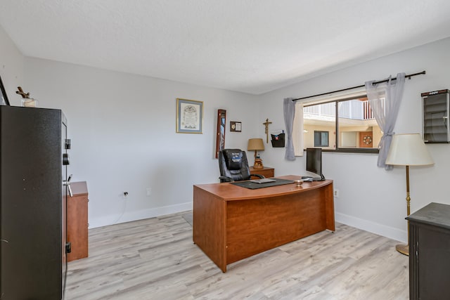 office featuring light hardwood / wood-style floors