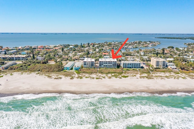 aerial view featuring a water view and a beach view