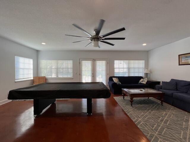 game room with billiards and ceiling fan