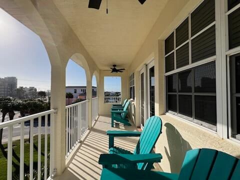 balcony featuring ceiling fan