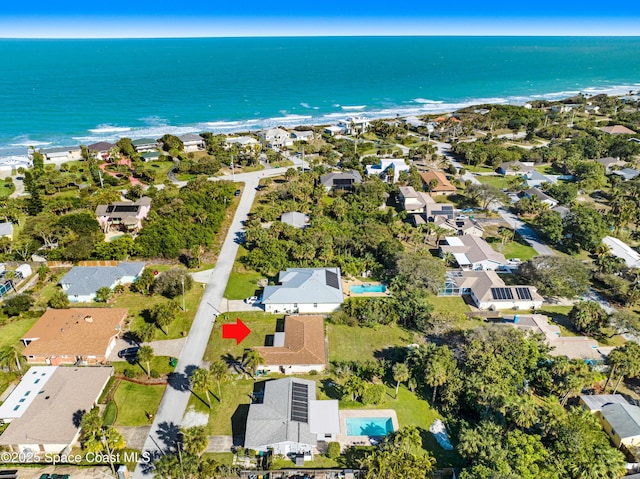 aerial view with a beach view and a water view