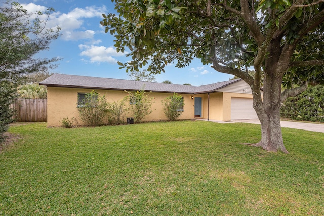 ranch-style house with a front yard and a garage