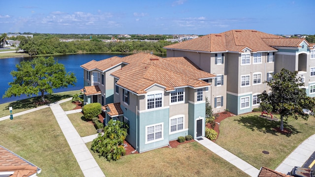 drone / aerial view with a water view