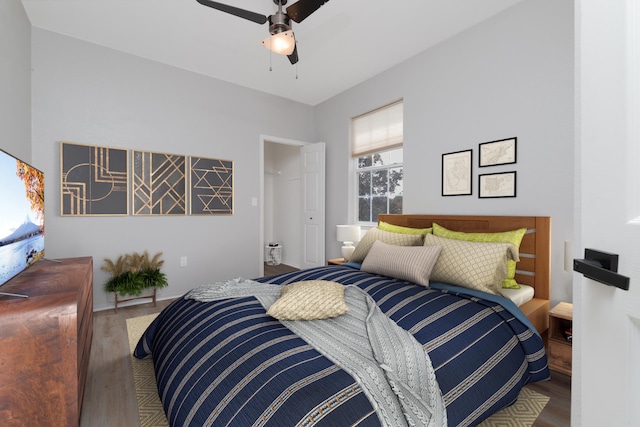 bedroom with wood-type flooring and ceiling fan