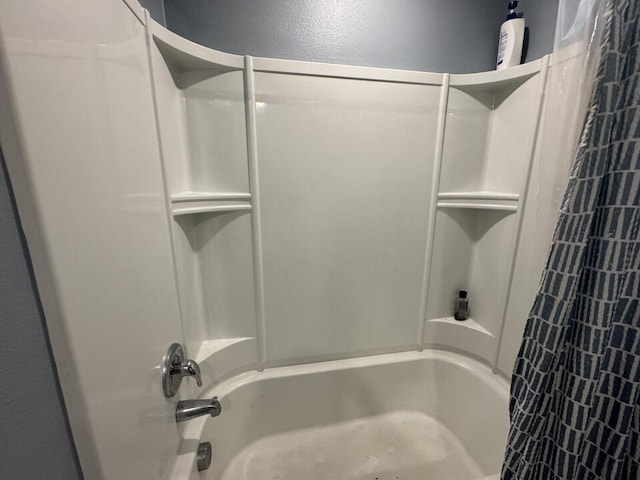 bathroom featuring tub / shower combination