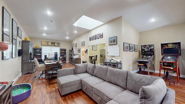 living room with lofted ceiling with skylight and dark hardwood / wood-style flooring