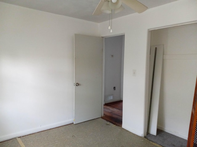 unfurnished room with hardwood / wood-style floors and ceiling fan