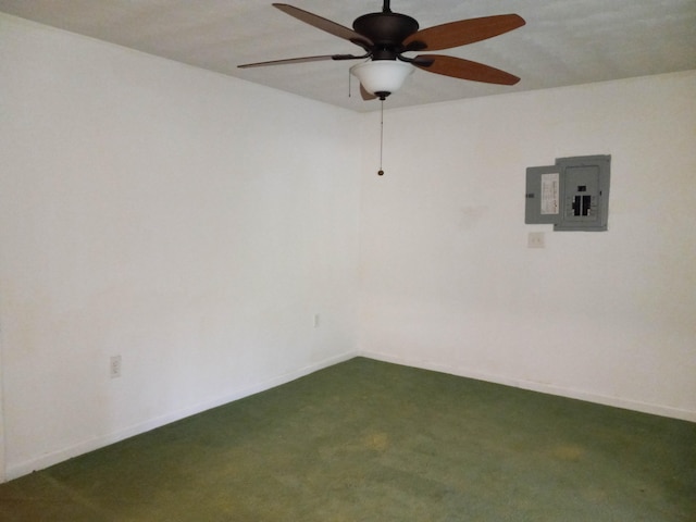 carpeted spare room featuring ceiling fan