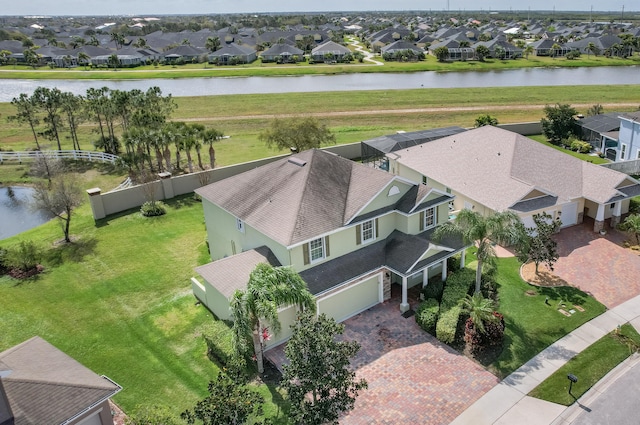 drone / aerial view with a water view