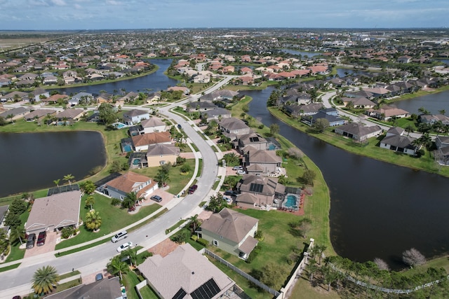 drone / aerial view with a water view