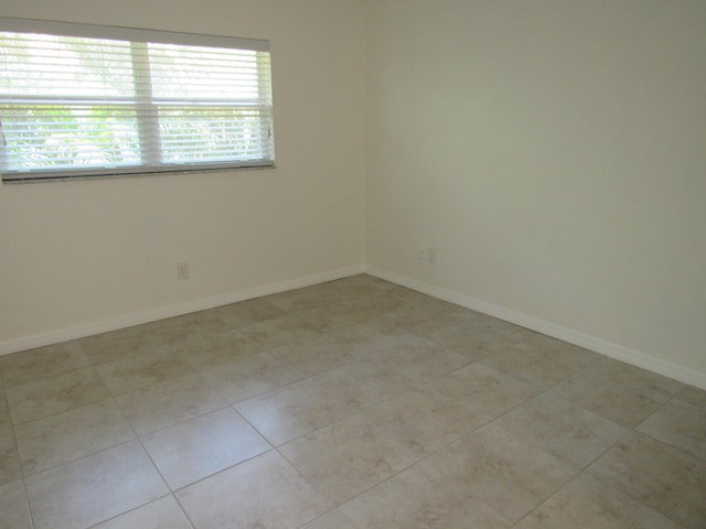 view of tiled spare room