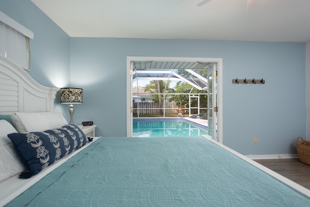 bedroom with hardwood / wood-style flooring, access to outside, and ceiling fan