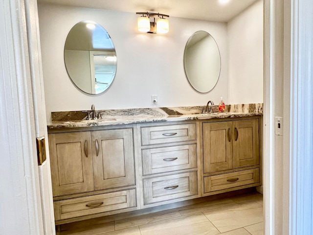 bathroom with dual bowl vanity