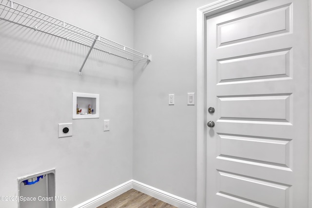 laundry room featuring laundry area, washer hookup, wood finished floors, baseboards, and electric dryer hookup