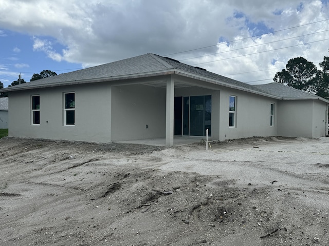 rear view of house featuring a patio area