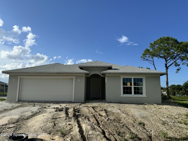 view of front of house with a garage