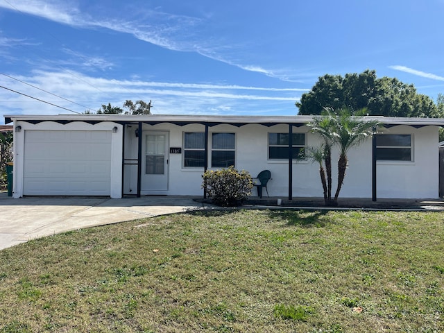 single story home with a garage and a front yard