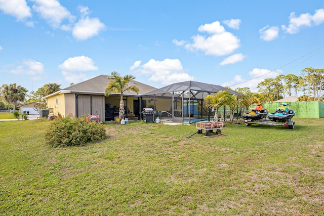 view of yard featuring a lanai and a pool