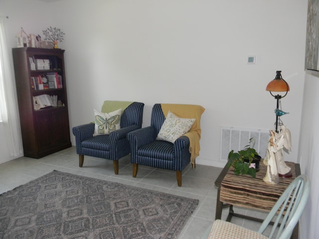 living area with light tile floors