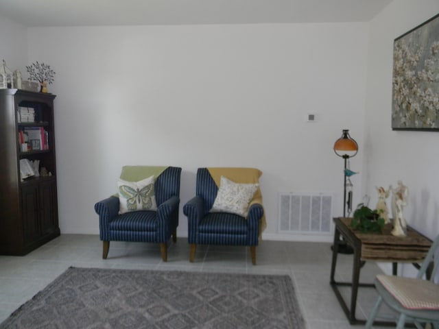 living area with light tile floors