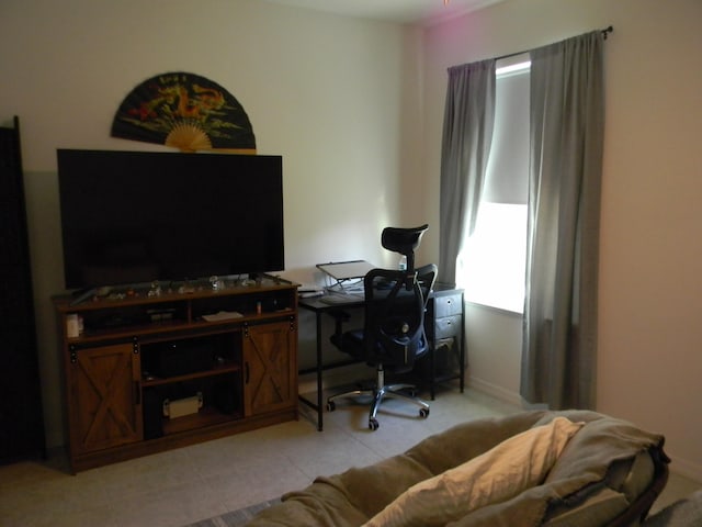 office space featuring light tile floors