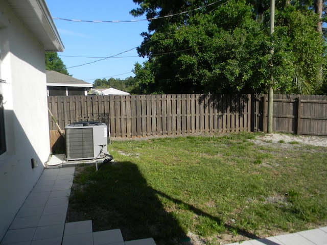 view of yard featuring central AC