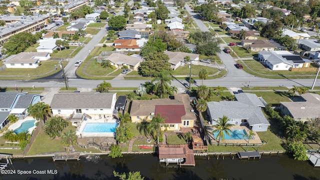 drone / aerial view with a water view