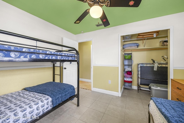 bedroom featuring ceiling fan and light tile patterned floors