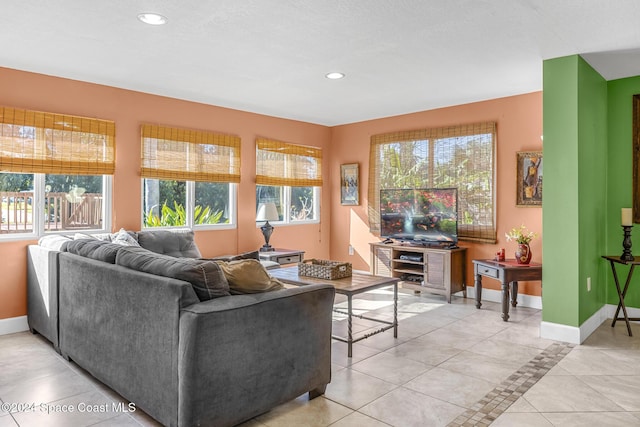 living room featuring light tile patterned flooring