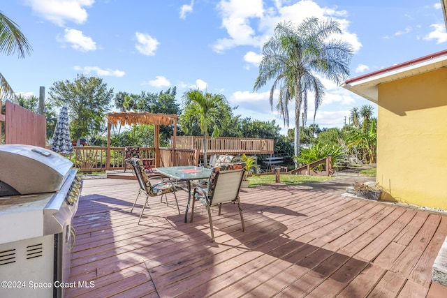 wooden deck with grilling area